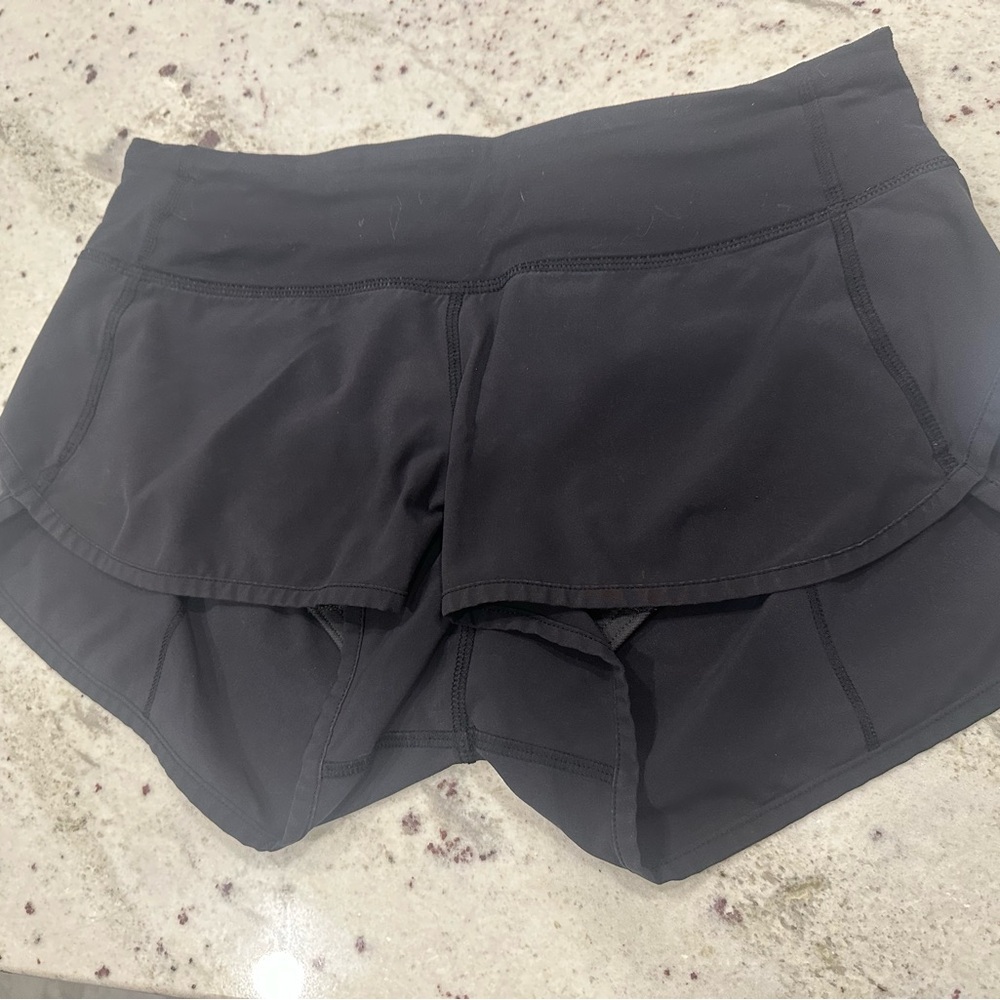 Lululemon Speed up size 4 
Black Women's Shorts 2.5” inseam